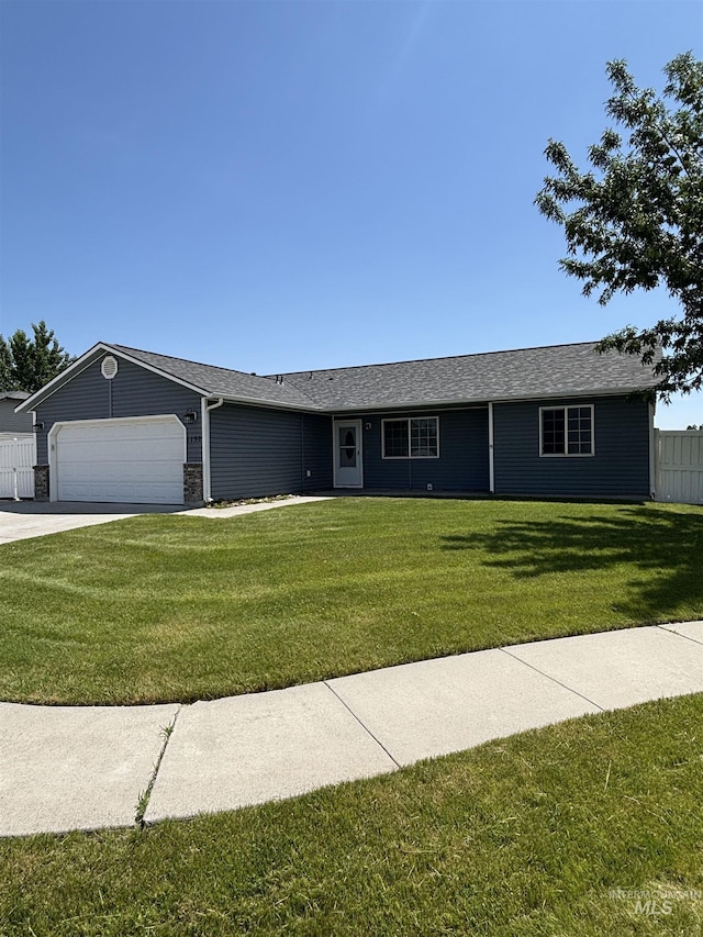 1150 NW 22nd St, Fruitland, ID 83619 - single story home featuring a garage, stone siding, and concrete driveway