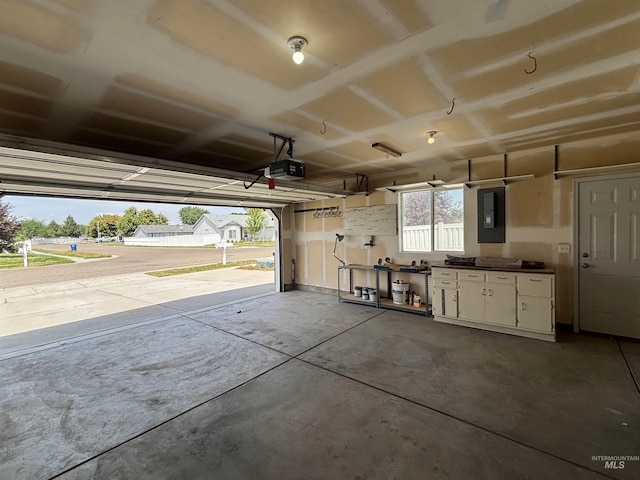1150 NW 22nd St, Fruitland, ID 83619 - garage with electric panel and a garage door opener