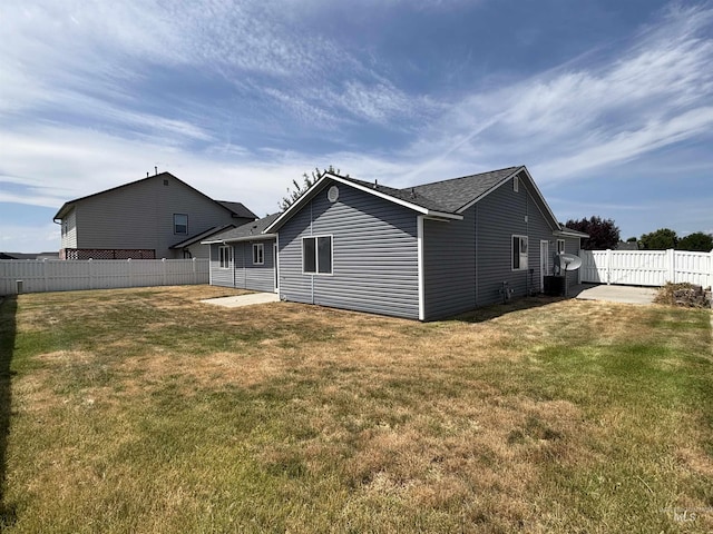 1150 NW 22nd St, Fruitland, ID 83619 - back of house with a shingled roof