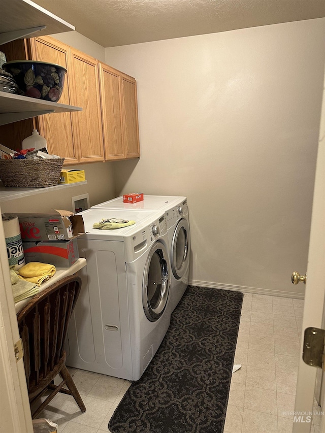 168 Long Is, Twin Falls, ID 83301 - laundry room featuring separate washer and dryer, baseboards, and cabinet space