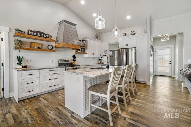 910 Blueridge Dr, Kimberly, ID 83341 - kitchen featuring open shelves, appliances with stainless steel finishes, custom exhaust hood, a sink, and decorative backsplash