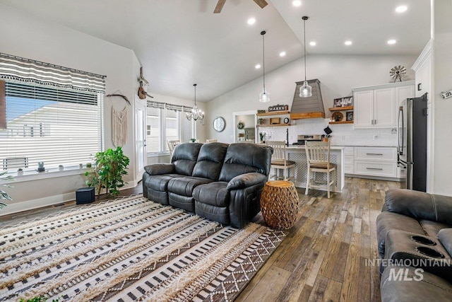 910 Blueridge Dr, Kimberly, ID 83341 - living room featuring wood finished floors, recessed lighting, a chandelier, and high vaulted ceiling