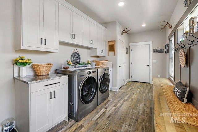 910 Blueridge Dr, Kimberly, ID 83341 - washroom with cabinet space, independent washer and dryer, hardwood / wood-style floors, recessed lighting, and baseboards