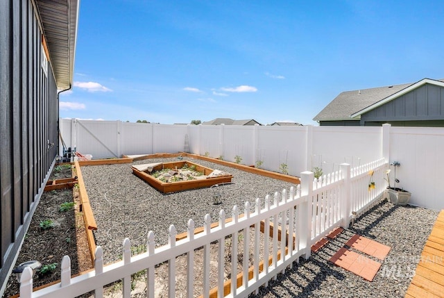 910 Blueridge Dr, Kimberly, ID 83341 - fenced backyard featuring a garden
