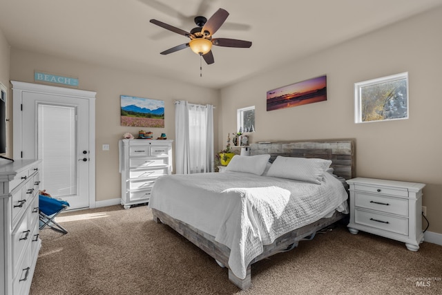 bedroom with ceiling fan and light colored carpet