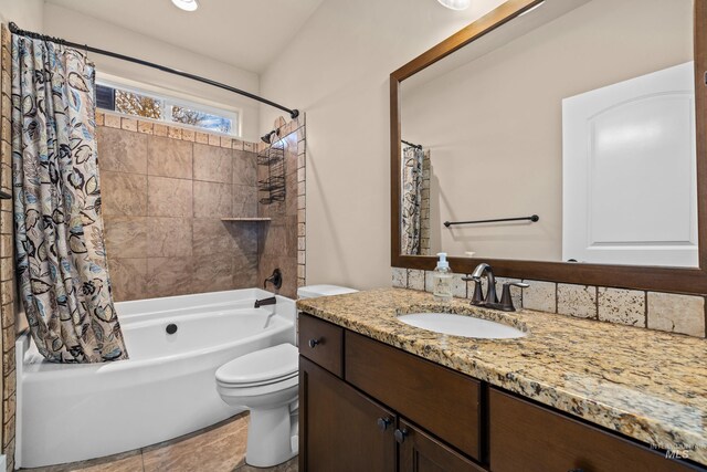 full bathroom featuring shower / bath combo, vanity, and toilet