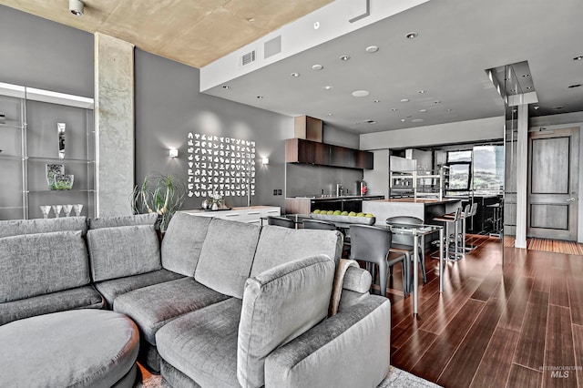 living room featuring dark wood-type flooring