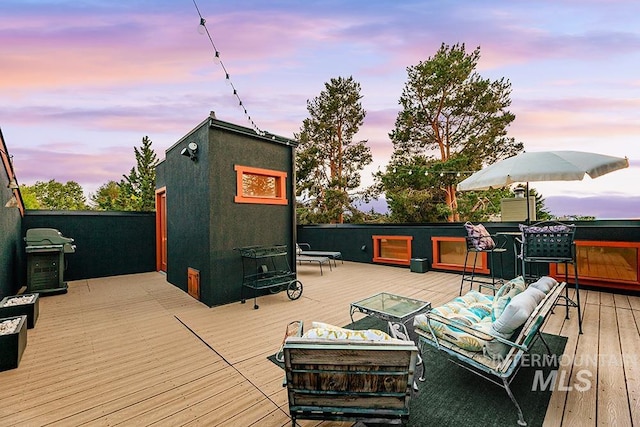 view of deck at dusk