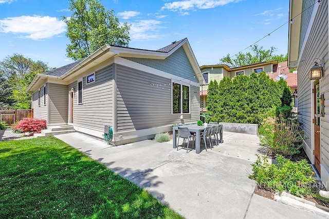 rear view of house featuring a patio area