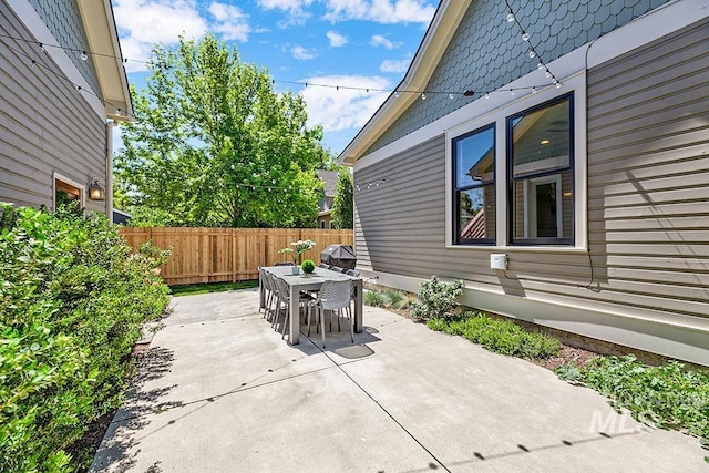view of patio / terrace with fence and outdoor dining area