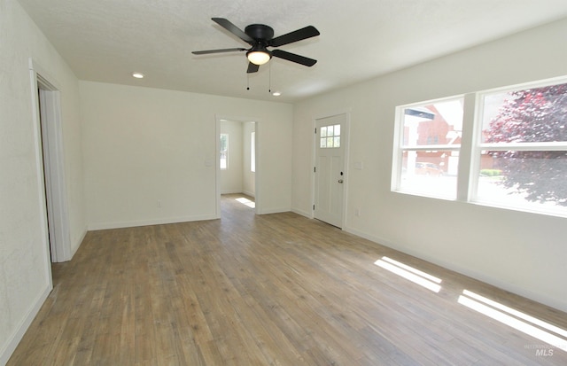324 Nectarine, Nampa, ID 83686 - unfurnished living room featuring wood finished floors, ceiling fan, and recessed lighting