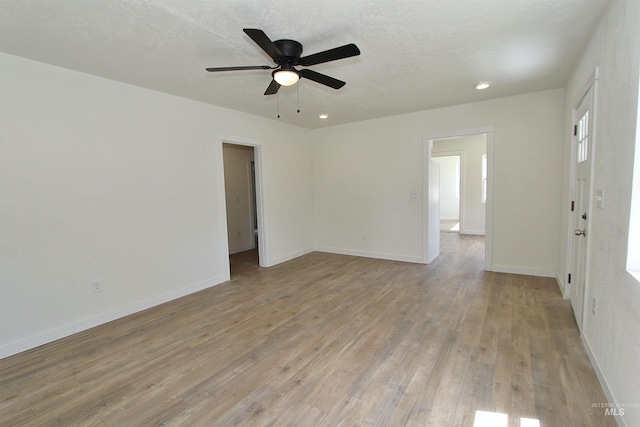 324 Nectarine, Nampa, ID 83686 - unfurnished room with light wood-style floors, a ceiling fan, and recessed lighting