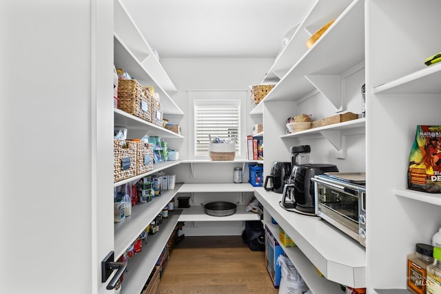storage area featuring a toaster
