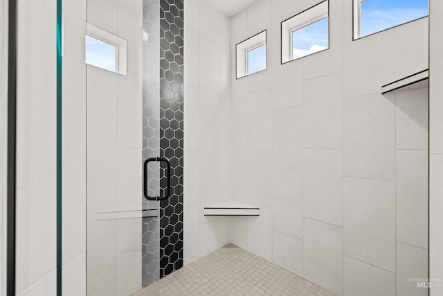 full bathroom with a shower stall
