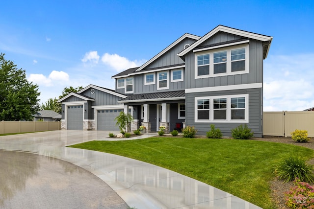 craftsman-style house featuring fence, board and batten siding, a porch, and driveway
