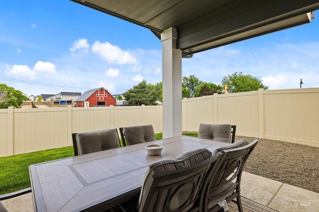 view of patio / terrace with a fenced backyard and outdoor dining space