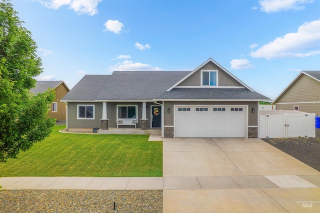 1724 Pioneer Dr, Lewiston, ID 83501 - craftsman inspired home with a gate, stone siding, an attached garage, and a shingled roof