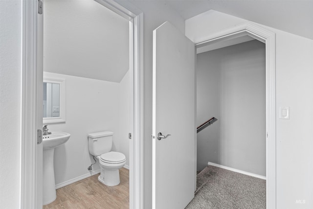 1724 Pioneer Dr, Lewiston, ID 83501 - half bath with wood finished floors and vaulted ceiling