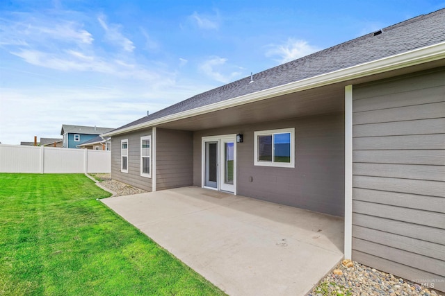 1724 Pioneer Dr, Lewiston, ID 83501 - back of house with a patio and a shingled roof