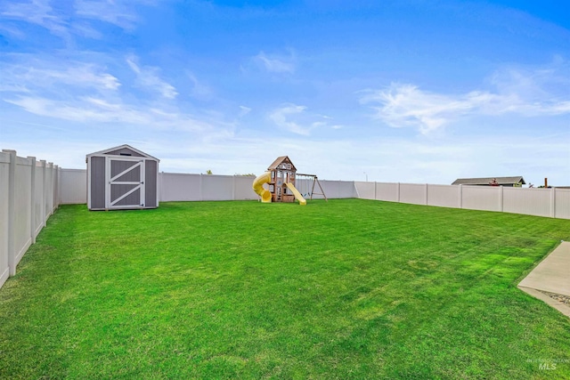 1724 Pioneer Dr, Lewiston, ID 83501 - fenced backyard featuring a playground and a shed
