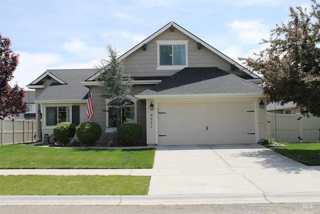 4951 W Torana St, Meridian, ID 83646 - view of front facade with a garage, concrete driveway, and roof with shingles