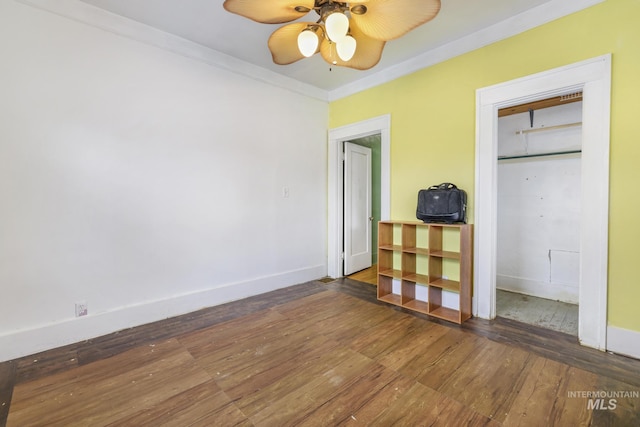 1631 Poplar Ave, Twin Falls, ID 83301 - unfurnished bedroom with crown molding, a ceiling fan, baseboards, and hardwood / wood-style flooring