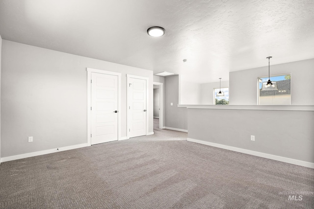 1755 N Crystal Cove Ave, Meridian, ID 83646 - empty room featuring carpet flooring and a textured ceiling