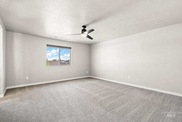 1755 N Crystal Cove Ave, Meridian, ID 83646 - spare room featuring ceiling fan, a textured ceiling, and carpet flooring