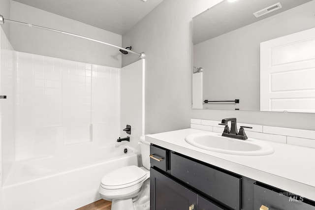 1755 N Crystal Cove Ave, Meridian, ID 83646 - bathroom featuring vanity, shower / bathtub combination, and wood finished floors