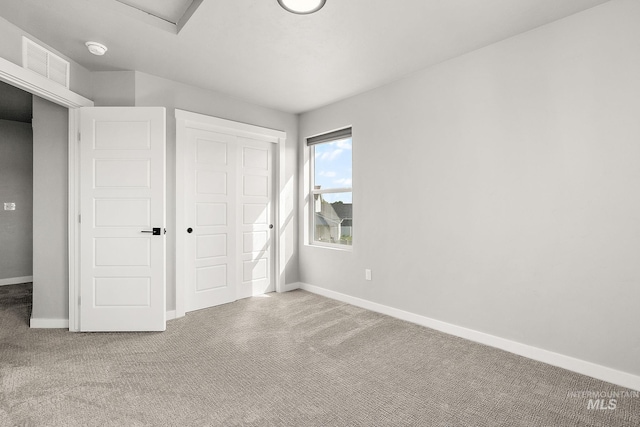 1755 N Crystal Cove Ave, Meridian, ID 83646 - unfurnished bedroom with carpet, a closet, and attic access
