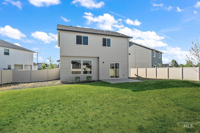 1755 N Crystal Cove Ave, Meridian, ID 83646 - back of house featuring a fenced backyard and a patio area