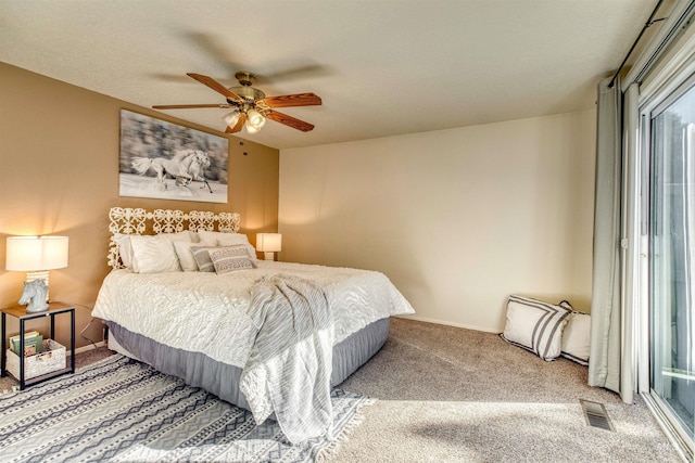 bedroom featuring baseboards, a ceiling fan, visible vents, and light colored carpet