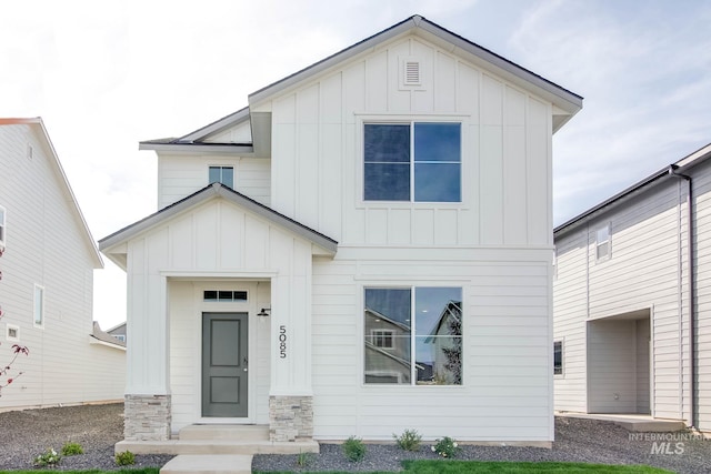 4391 N Magical Creek Ave, Meridian, ID 83646 - modern farmhouse style home with board and batten siding