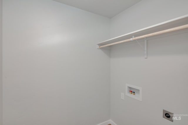 4391 N Magical Creek Ave, Meridian, ID 83646 - laundry area with baseboards, electric dryer hookup, laundry area, and hookup for a washing machine