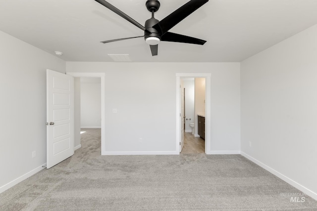 4391 N Magical Creek Ave, Meridian, ID 83646 - unfurnished bedroom featuring carpet floors, baseboards, ceiling fan, and ensuite bath