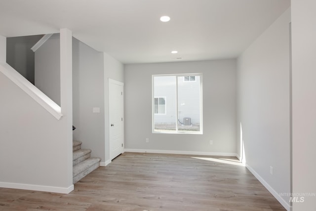 4391 N Magical Creek Ave, Meridian, ID 83646 - interior space with recessed lighting, stairway, light wood-style flooring, and baseboards