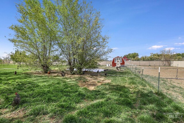 view of yard featuring an outbuilding and a barn