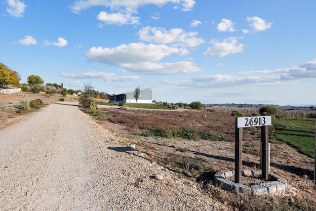 view of road featuring a rural view