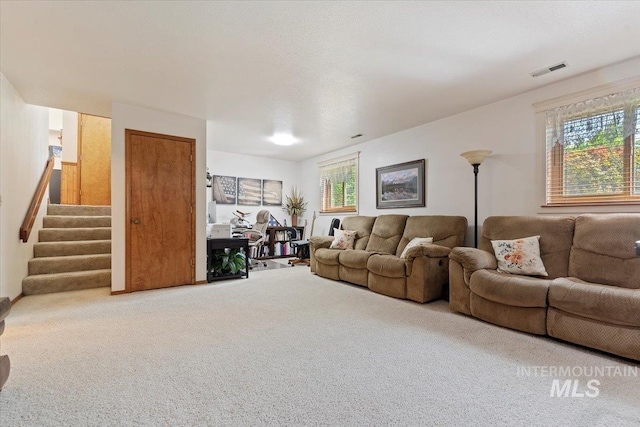 11722 W Jenilyn, Boise, ID 83713 - carpeted living area featuring stairs