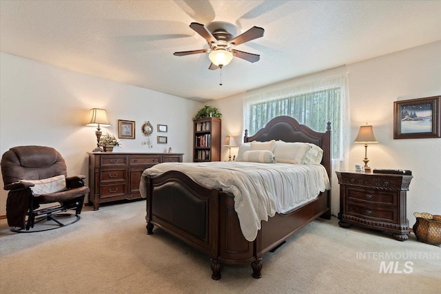 11722 W Jenilyn, Boise, ID 83713 - bedroom featuring light colored carpet and a ceiling fan