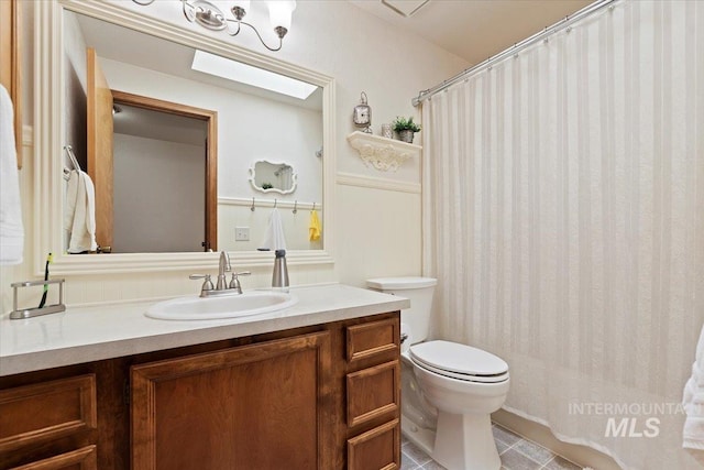 11722 W Jenilyn, Boise, ID 83713 - full bath featuring toilet, vanity, and a shower with curtain