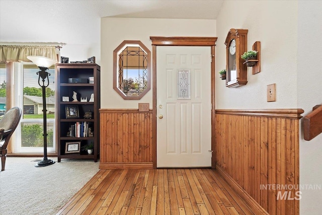 11722 W Jenilyn, Boise, ID 83713 - foyer featuring a wainscoted wall, wood walls, and light wood finished floors