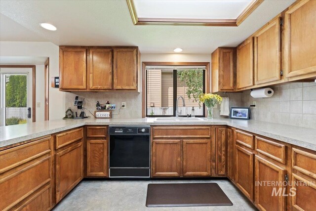 11722 W Jenilyn, Boise, ID 83713 - kitchen featuring dishwasher, a sink, healthy amount of natural light, light countertops, and recessed lighting
