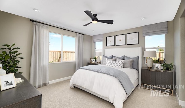 546 Thistle Hills Ave, Middleton, ID 83644 - bedroom with baseboards, a ceiling fan, and light carpet