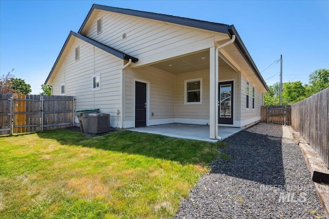 10276 W Utahna Rd, Boise, ID 83714 - back of property featuring a patio, central AC, and a gate