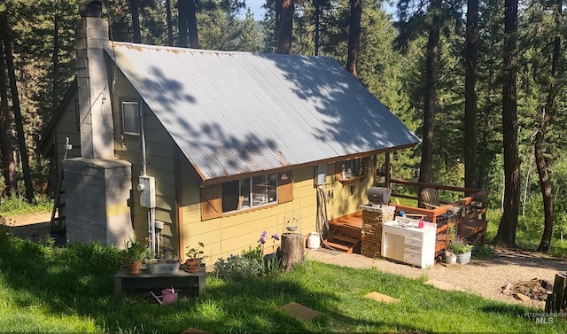 11 Turner Cir, Boise, ID 83716 - view of front facade with a metal roof and a deck
