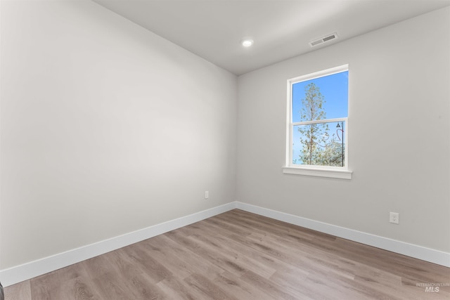 202 S Koyukuk Ln, Star, ID 83669 - unfurnished room with baseboards, light wood-type flooring, and recessed lighting