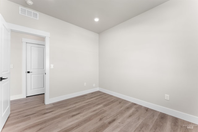 202 S Koyukuk Ln, Star, ID 83669 - empty room with light wood-type flooring, baseboards, and recessed lighting