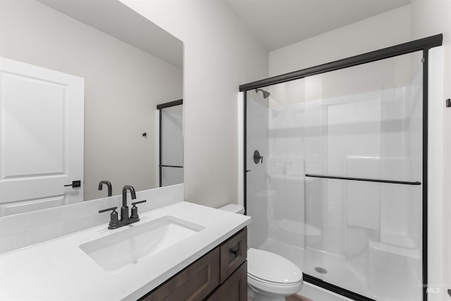 202 S Koyukuk Ln, Star, ID 83669 - bathroom with toilet, a stall shower, and vanity