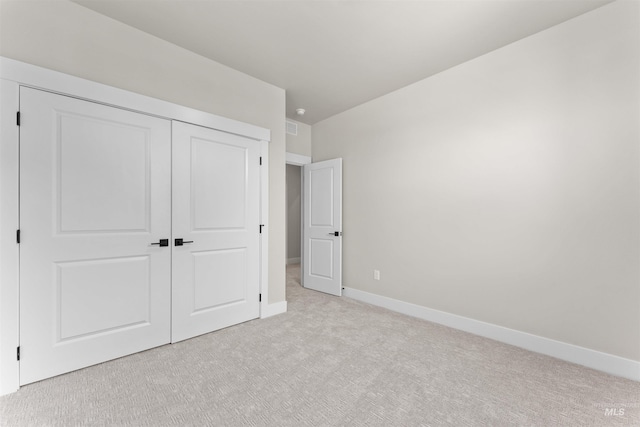202 S Koyukuk Ln, Star, ID 83669 - unfurnished bedroom with carpet flooring, a closet, and baseboards
